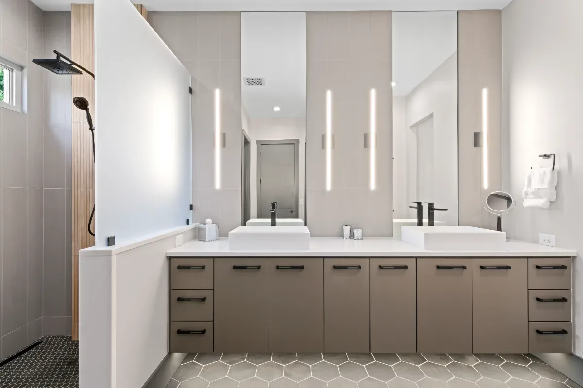 Primary Bath remodel in Westhaven, TN. Sebring Design Build transformed this Westhaven primary bath in Franklin, Tennessee with CWP Notable Slab Marion Gray cabinetry, polished quartz countertops.