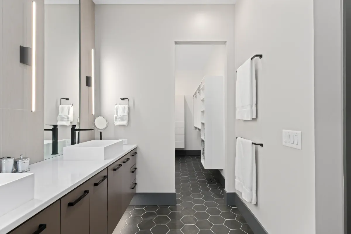 Primary Bath remodel in Westhaven, TN. Sebring Design Build transformed this Westhaven primary bath in Franklin, Tennessee with CWP Notable Slab Marion Gray cabinetry, polished quartz countertops.