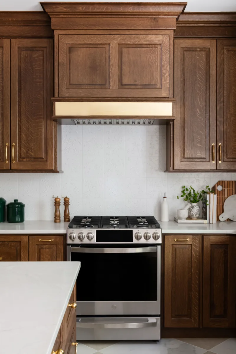 Kitchen remodel in Chenoweth, TN. Sebring Design Build transformed this Chenoweth kitchen in Brentwood, Tennessee with CWP Classic Square Raised Solid Wood Panel White Oak Coffee Marginal Overlay cabinetry.