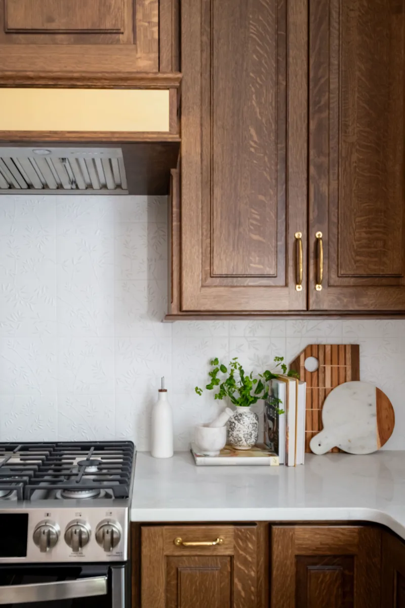 Kitchen remodel in Chenoweth, TN. Sebring Design Build transformed this Chenoweth kitchen in Brentwood, Tennessee with CWP Classic Square Raised Solid Wood Panel White Oak Coffee Marginal Overlay cabinetry.