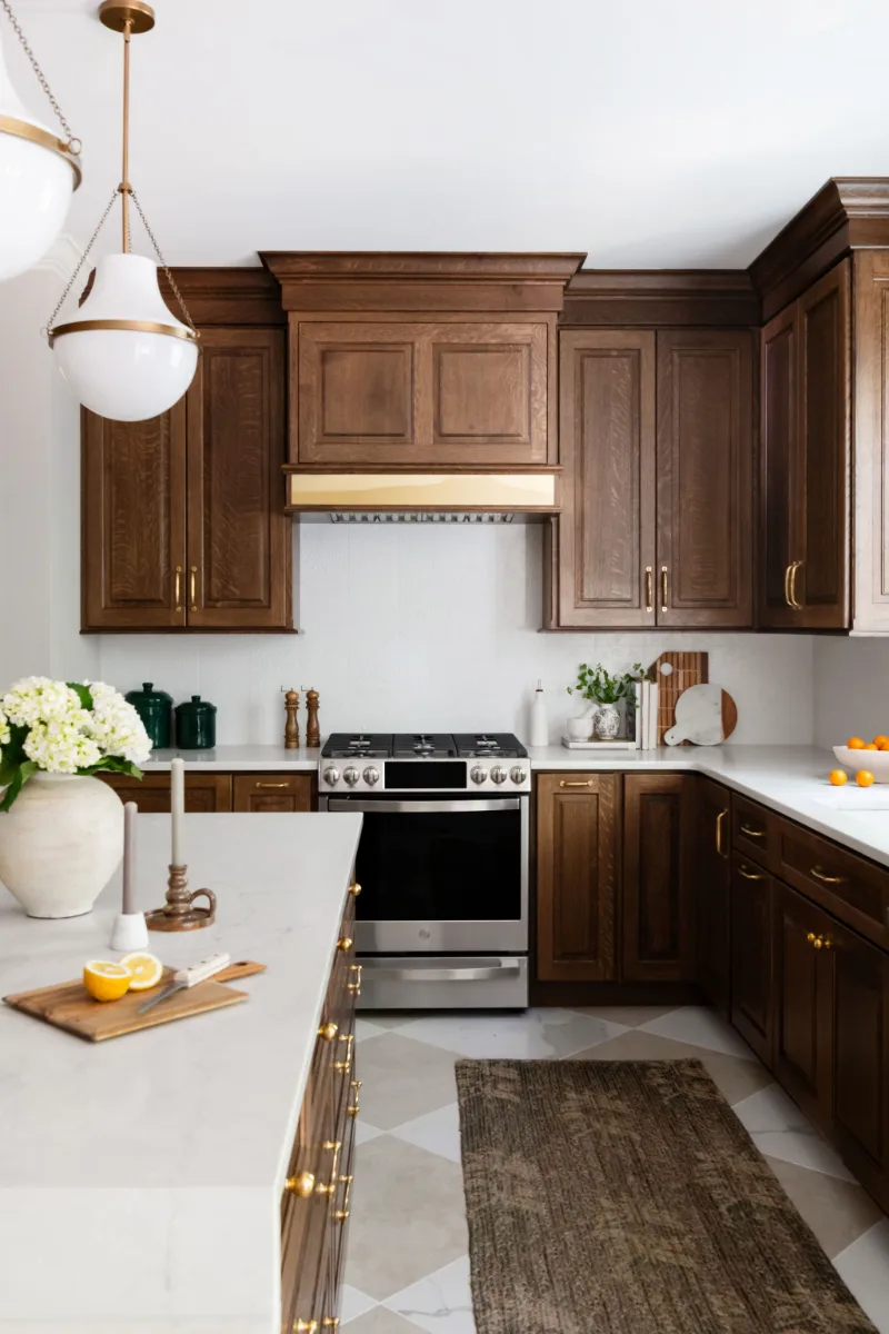 Kitchen remodel in Chenoweth, TN. Sebring Design Build transformed this Chenoweth kitchen in Brentwood, Tennessee with CWP Classic Square Raised Solid Wood Panel White Oak Coffee Marginal Overlay cabinetry.