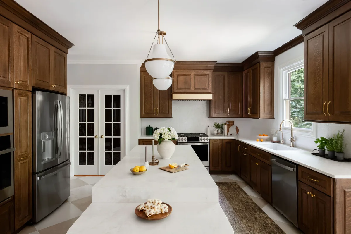 Kitchen remodel in Chenoweth, TN. Sebring Design Build transformed this Chenoweth kitchen in Brentwood, Tennessee with CWP Classic Square Raised Solid Wood Panel White Oak Coffee Marginal Overlay cabinetry.