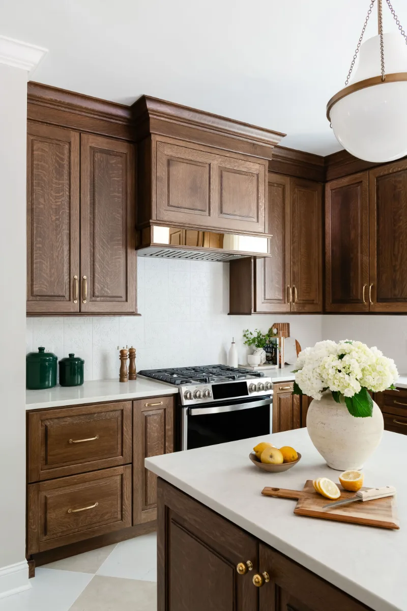Kitchen remodel in Chenoweth, TN. Sebring Design Build transformed this Chenoweth kitchen in Brentwood, Tennessee with CWP Classic Square Raised Solid Wood Panel White Oak Coffee Marginal Overlay cabinetry.