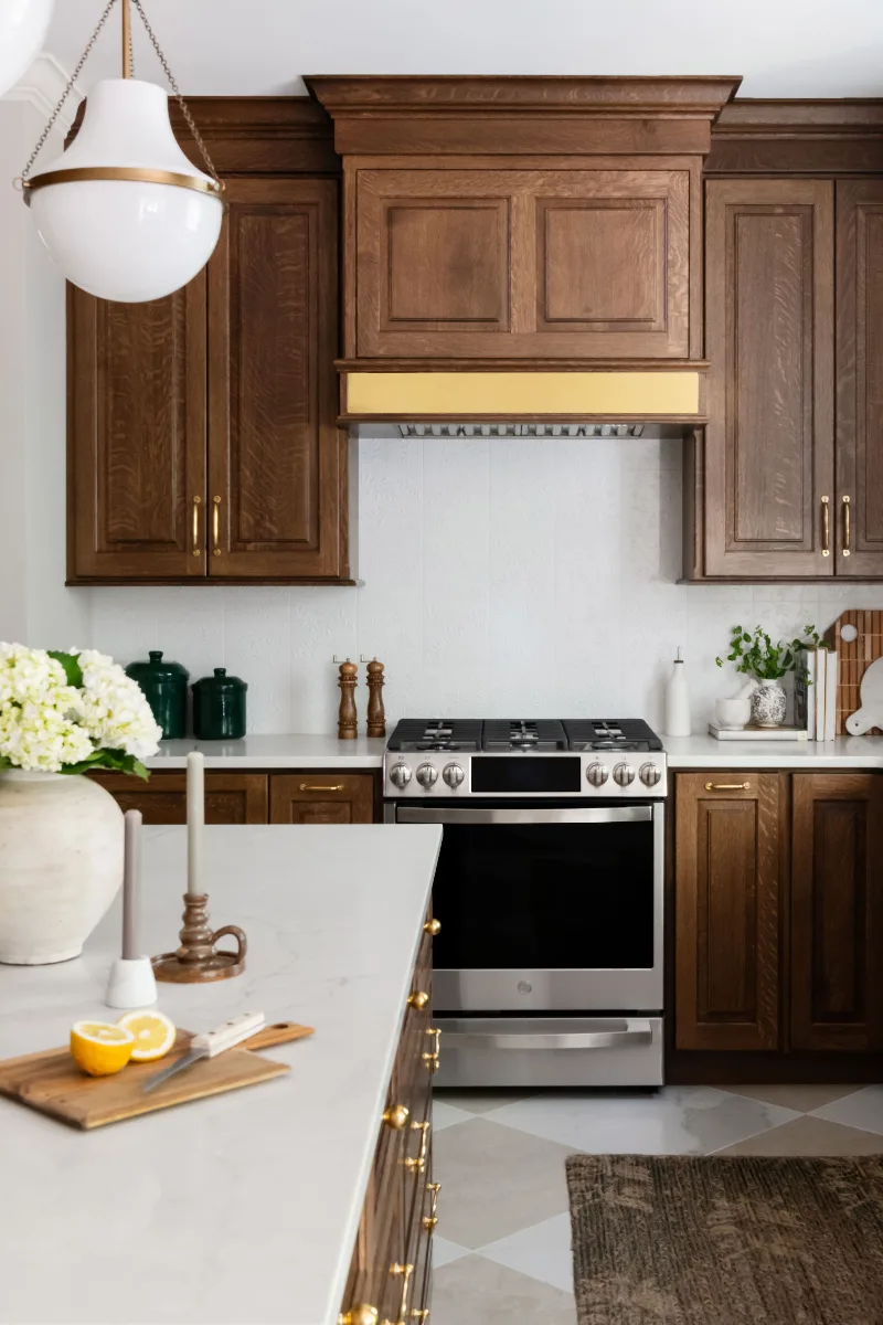 Kitchen remodel in Chenoweth, TN. Sebring Design Build transformed this Chenoweth kitchen in Brentwood, Tennessee with CWP Classic Square Raised Solid Wood Panel White Oak Coffee Marginal Overlay cabinetry.