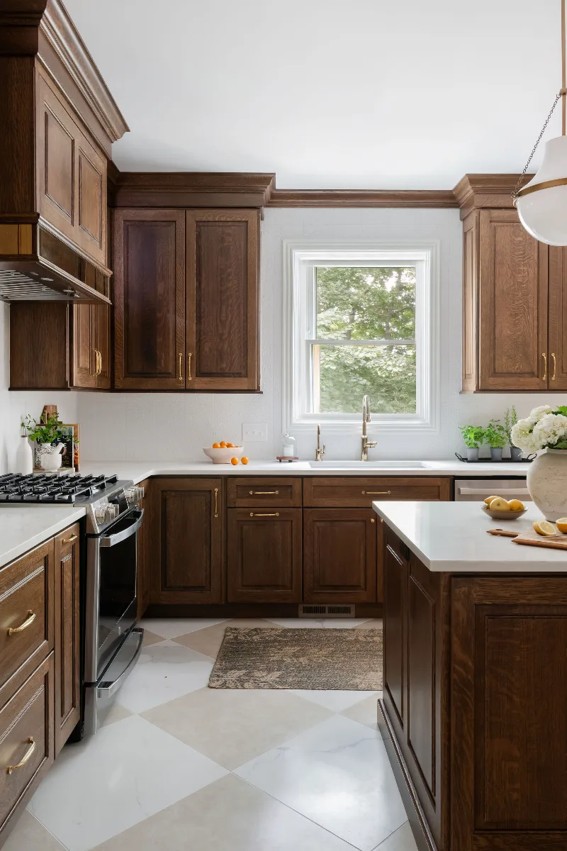 Kitchen remodel in Chenoweth, TN. Sebring Design Build transformed this Chenoweth kitchen in Brentwood, Tennessee with CWP Classic Square Raised Solid Wood Panel White Oak Coffee Marginal Overlay cabinetry.