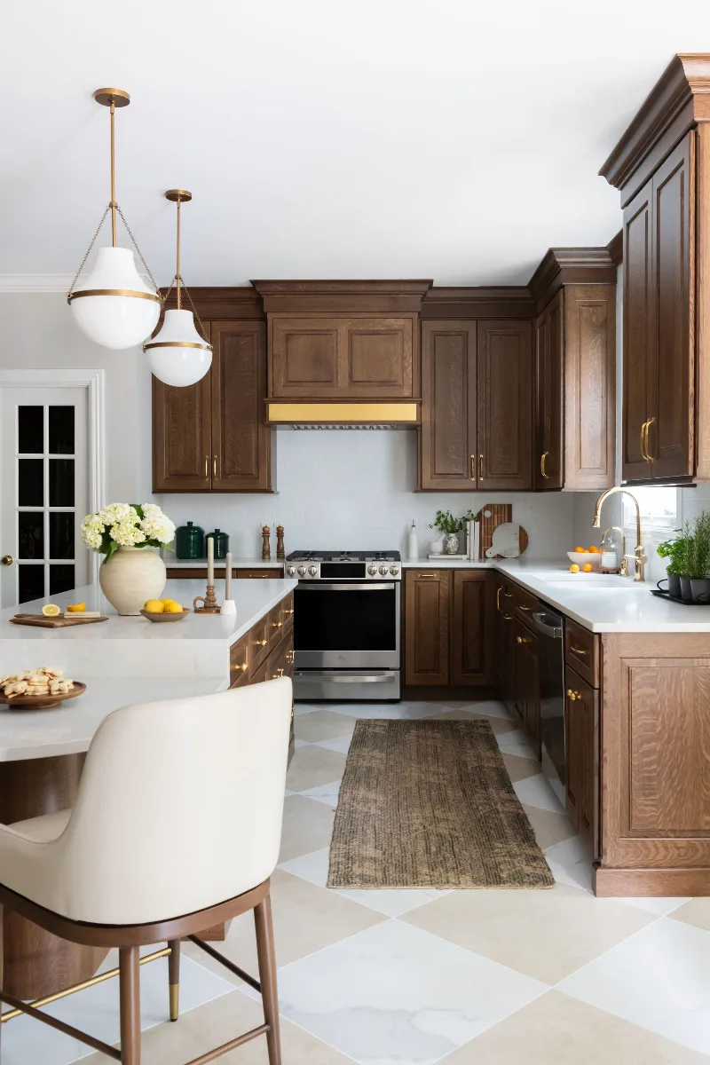 Kitchen remodel in Chenoweth, TN. Sebring Design Build transformed this Chenoweth kitchen in Brentwood, Tennessee with CWP Classic Square Raised Solid Wood Panel White Oak Coffee Marginal Overlay cabinetry.