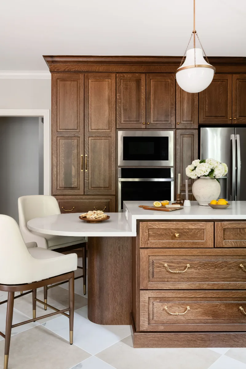 Kitchen remodel in Chenoweth, TN. Sebring Design Build transformed this Chenoweth kitchen in Brentwood, Tennessee with CWP Classic Square Raised Solid Wood Panel White Oak Coffee Marginal Overlay cabinetry.