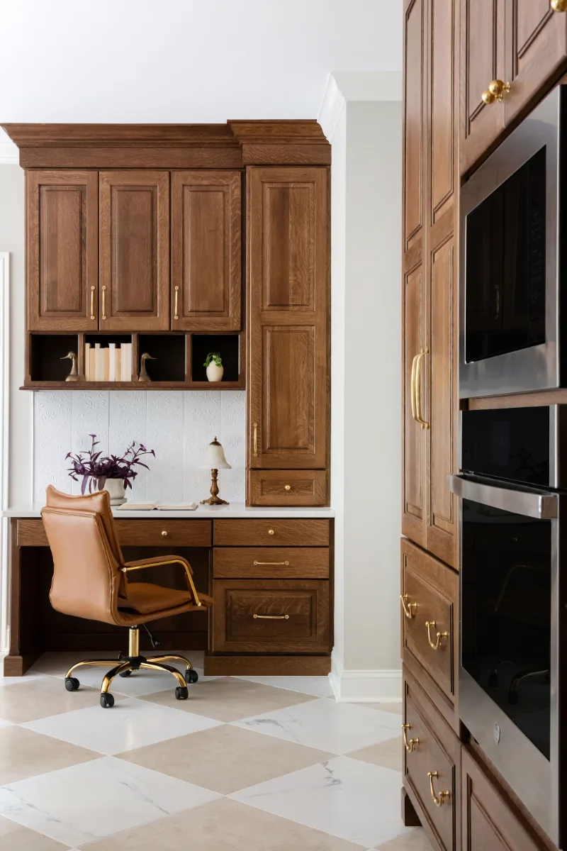Kitchen remodel in Chenoweth, TN. Sebring Design Build transformed this Chenoweth kitchen in Brentwood, Tennessee with CWP Classic Square Raised Solid Wood Panel White Oak Coffee Marginal Overlay cabinetry.