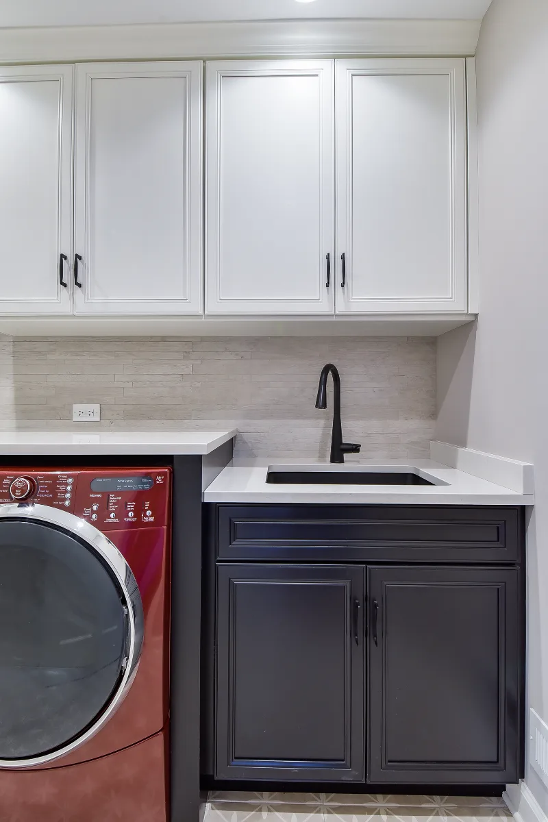 Laundry remodel in Franklin, TN. Sebring Design Build transformed this Franklin, Tennessee laundry room with CWP Highlander Recessed cabinetry in SW Little Boy Blue lockers and Mist white uppers.