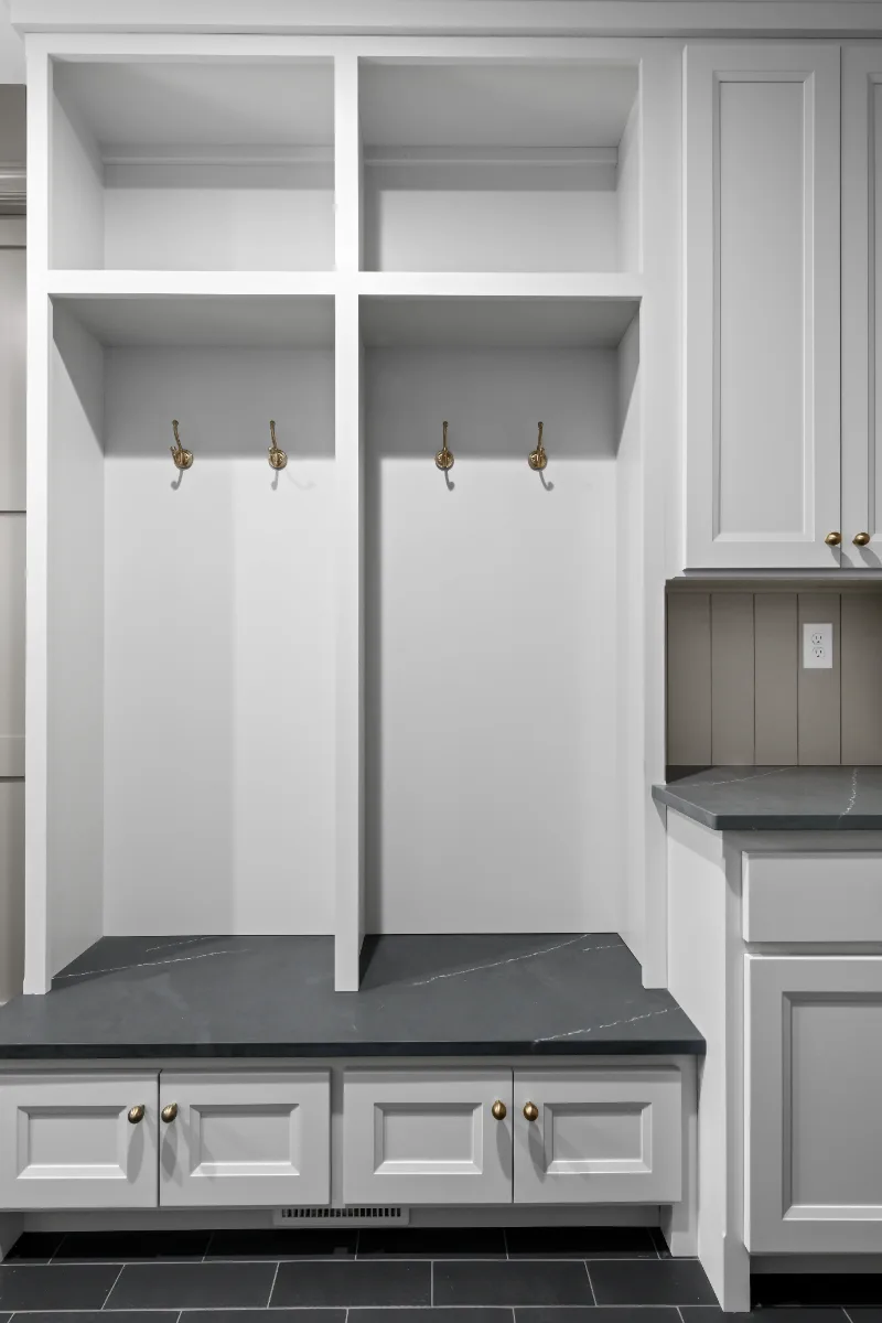 Laundry remodel in Columbia, TN. Sebring Design Build transformed this Columbia, Tennessee laundry room from a utility space into a fully designed room with Paint Grade Stone cabinetry.