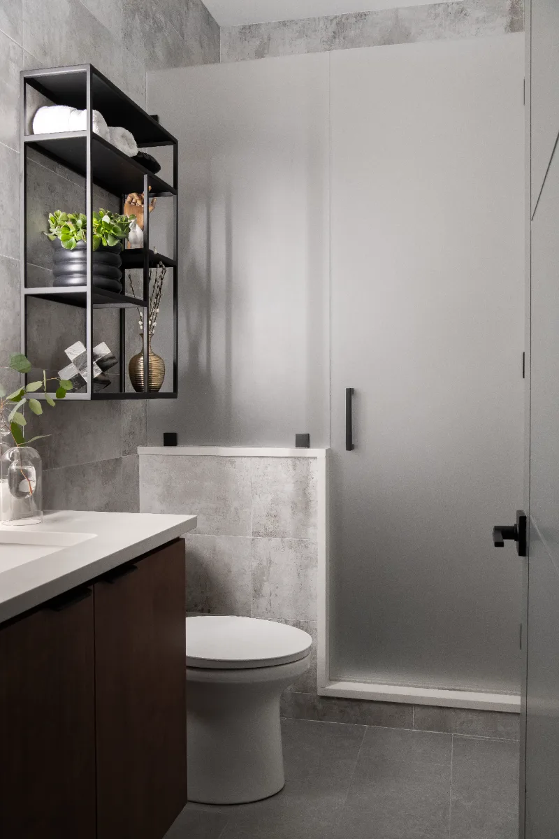 Guest Bath remodel in Franklin, TN. Sebring Design Build designed this Westhaven guest bath in Franklin, Tennessee with Alder Nutmeg cabinetry, Mikado Siberia White Leathered quartz, Hansgrohe Matte Black fixtures throughout.