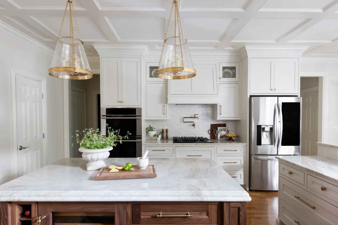 Kitchen remodel in Cool Springs, TN. Sebring Design Build transformed this Cool Springs kitchen in Franklin, Tennessee with Havana Square Recessed MDF Panel soft white cabinetry.