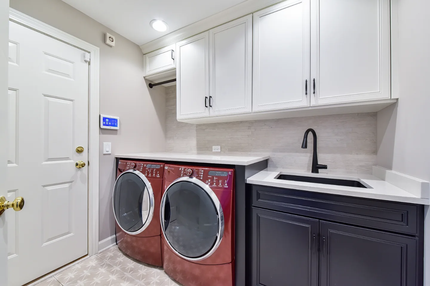 Laundry remodel in Franklin, TN. Sebring Design Build transformed this Franklin, Tennessee laundry room with CWP Highlander Recessed cabinetry in SW Little Boy Blue lockers and Mist white uppers.