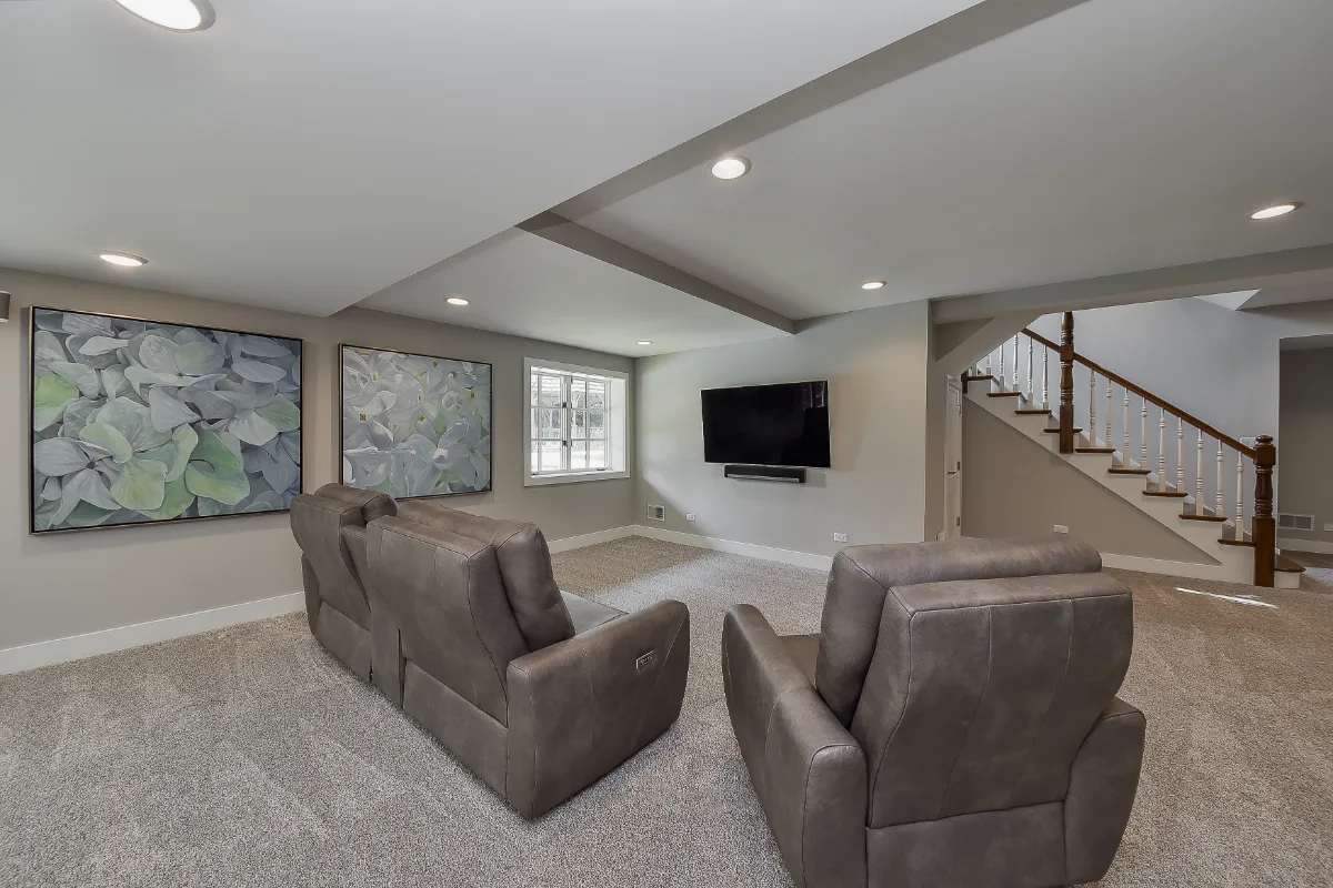 Basement remodel in Franklin, TN. Sebring Design Build finished this Franklin, Tennessee basement as a multi-zone functional-modern lower level with a main living area, gym, wet bar, guest bath, and workshop.