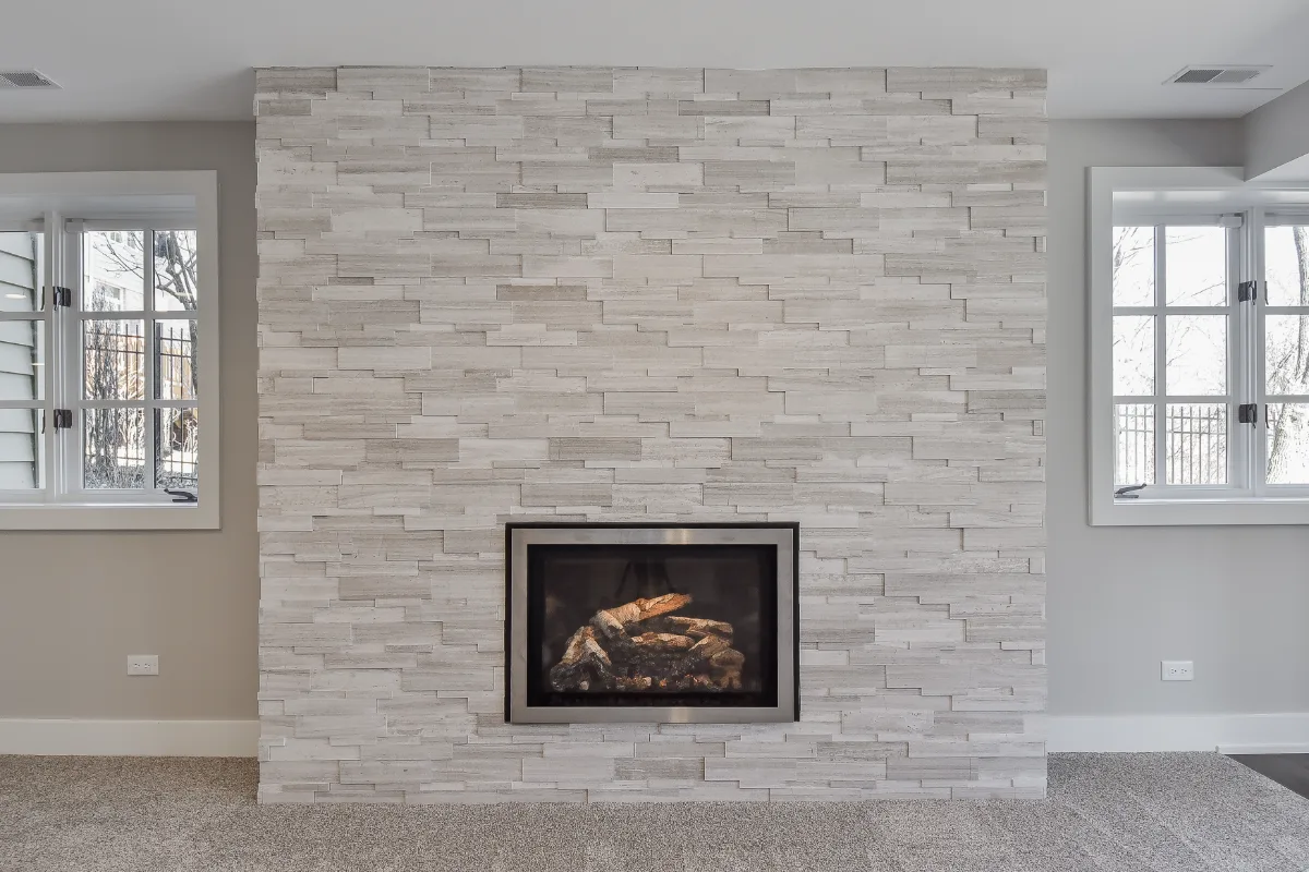 Basement remodel in Franklin, TN. Sebring Design Build finished this Franklin, Tennessee basement as a multi-zone functional-modern lower level with a main living area, gym, wet bar, guest bath, and workshop.