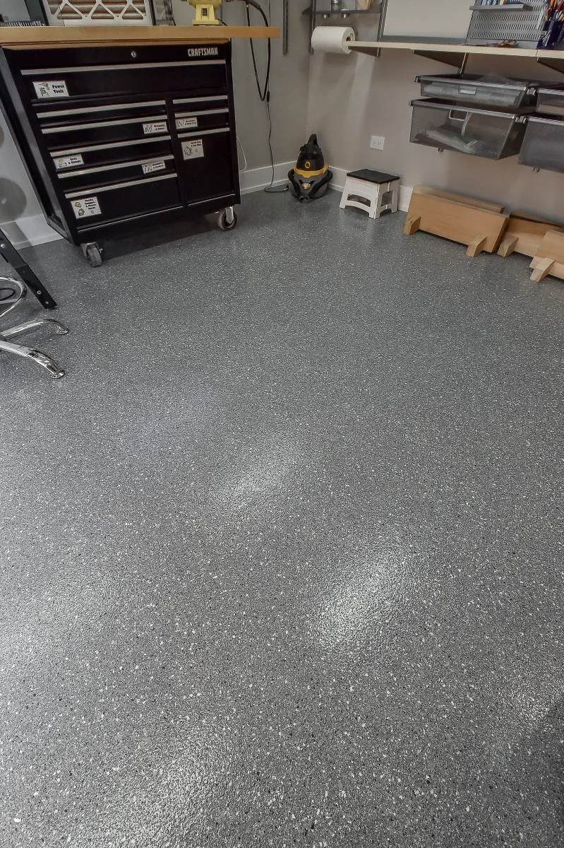 Workshop remodel in Franklin, TN. Sebring Design Build finished this Franklin basement workshop with a concrete floor finish built for real work: durable, honest to the space's purpose.