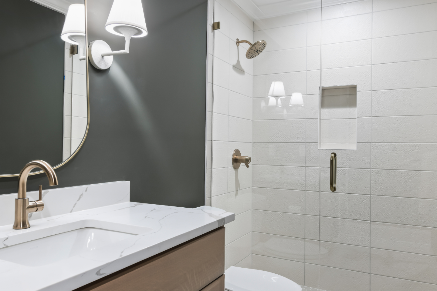 Guest Bath remodel in Watkins Creek, TN. Sebring Design Build designed this Watkins Creek guest bath (HER) in Franklin, Tennessee with White Oak Tatami cabinetry, Mikado Calacatta Tree quartz.