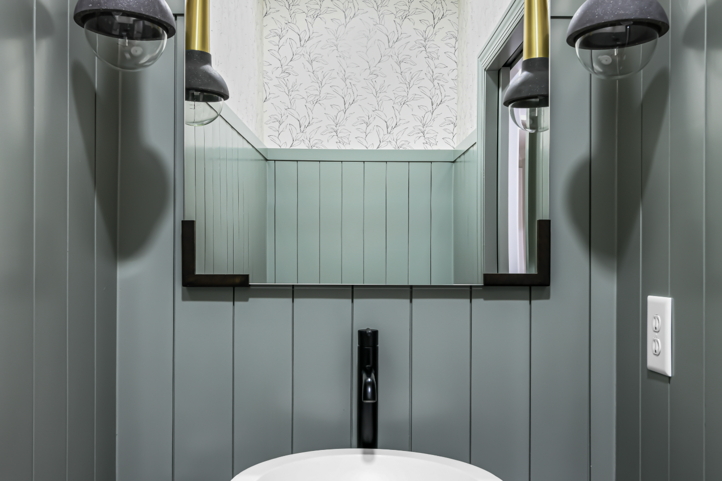 Powder Room remodel in Watkins Creek, TN. Sebring Design Build created this Watkins Creek powder room in Franklin, Tennessee as a room with genuine personality: Ripe Olive and Champagne stain cabinetry, Mikado Cemento quartz.