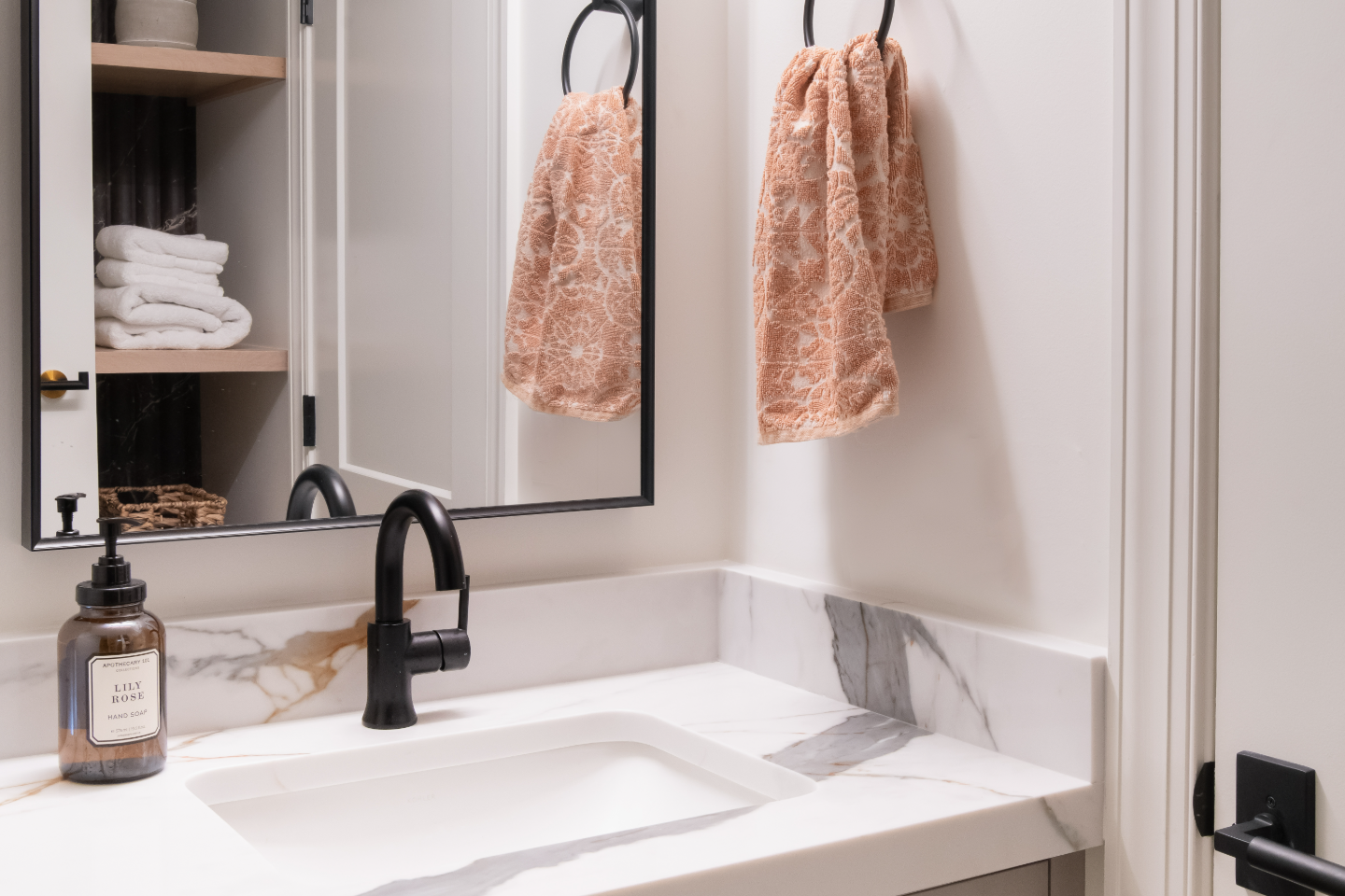 Guest Bath remodel in Franklin, TN. Sebring Design Build designed this Bonbrook basement guest bath in Brentwood, Tennessee with a modern-functional tile program featuring Kenridge Ribbon Maple shower walls.
