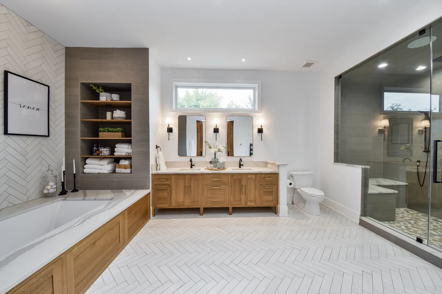 Primary Bath remodel in Franklin, TN. Sebring Design Build transformed this Franklin, Tennessee primary bath into a warm, elegant retreat with Metro Recessed White Oak cabinetry in Sage, Cambria Brittanicca Warm quartz.