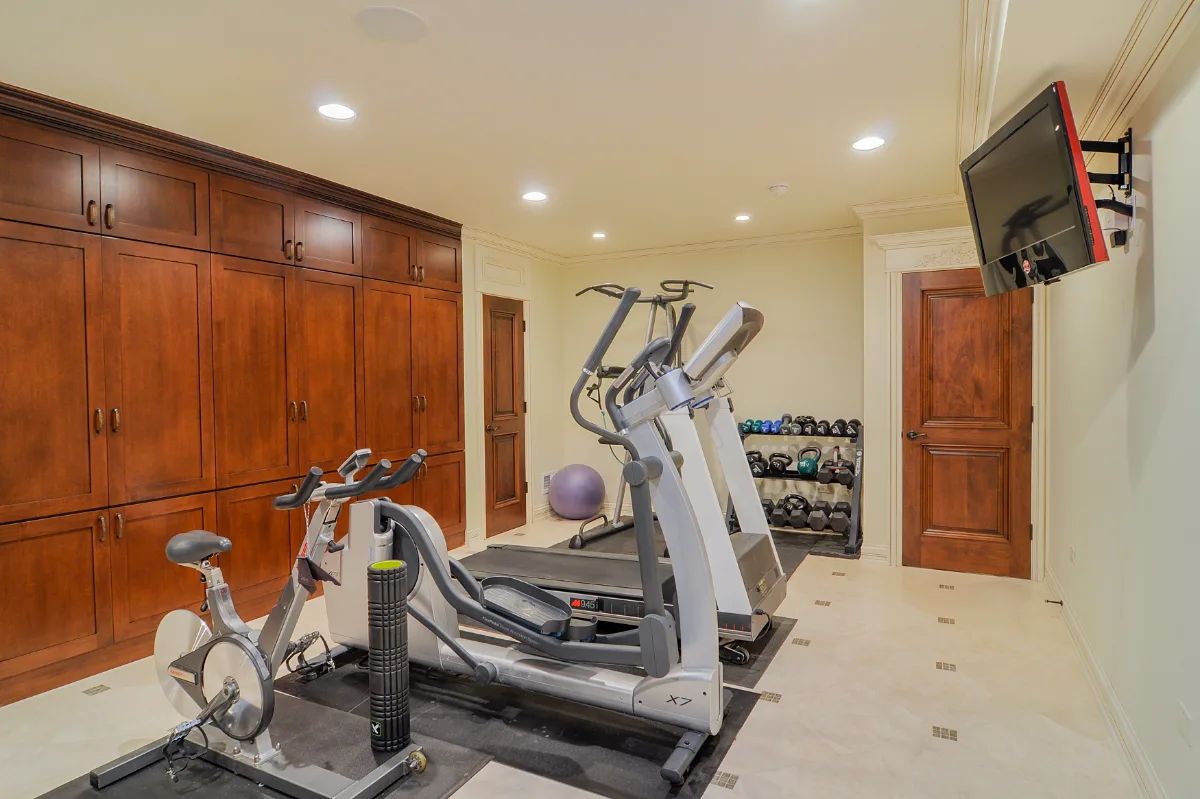 Basement remodel in Franklin, TN. Sebring Design Build transformed this Franklin, Tennessee basement into a traditional-intricate entertaining level with a coffered ceiling featuring rich wood finishes.