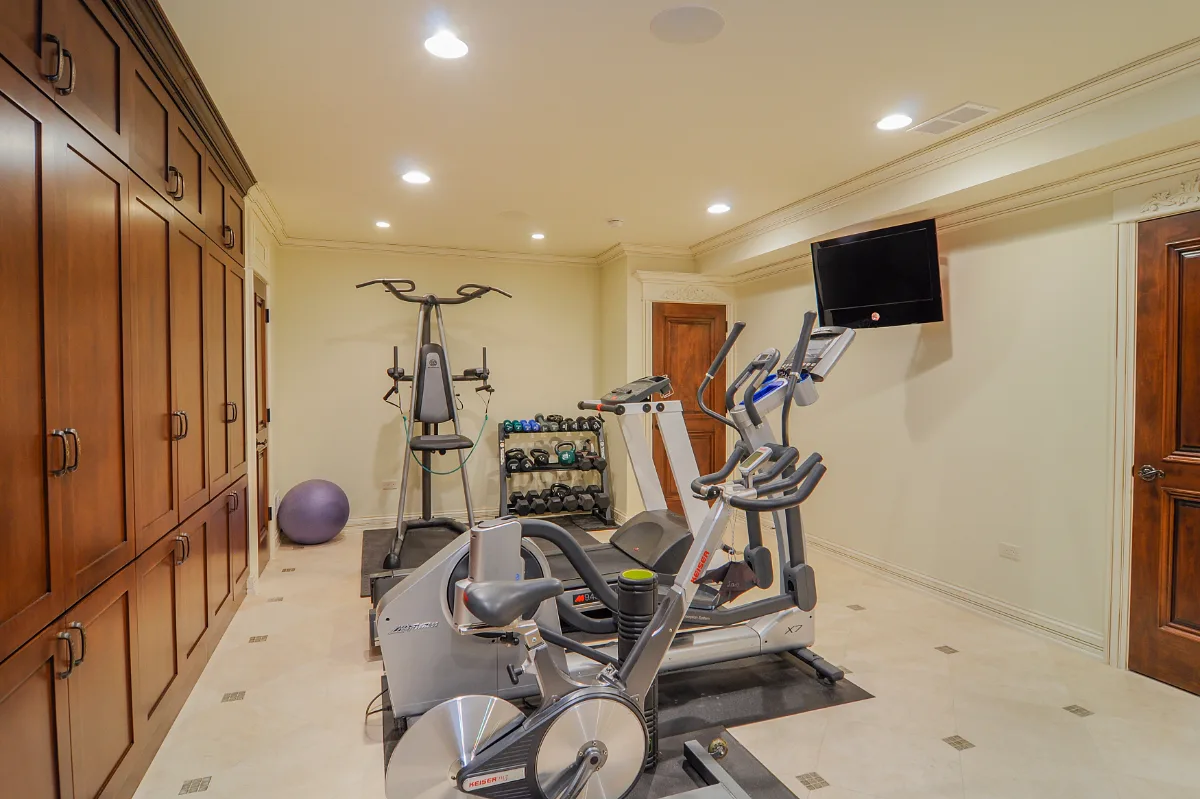 Basement remodel in Franklin, TN. Sebring Design Build transformed this Franklin, Tennessee basement into a traditional-intricate entertaining level with a coffered ceiling featuring rich wood finishes.
