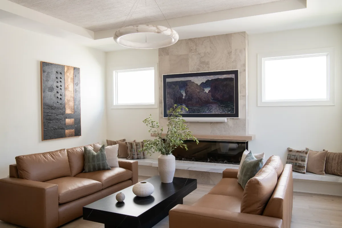 Living Room remodel in Westhaven, TN. Sebring Design Build designed this Westhaven living room to extend the kitchen’s minimalist palette with Rift White Oak elements and DuChateau Sirocco wood flooring.