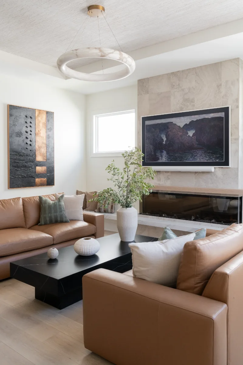 Living Room remodel in Westhaven, TN. Sebring Design Build designed this Westhaven living room to extend the kitchen’s minimalist palette with Rift White Oak elements and DuChateau Sirocco wood flooring.