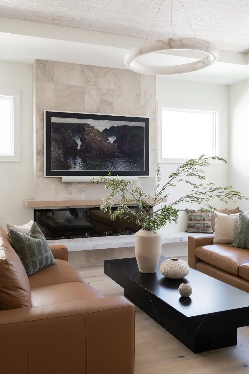 Living Room remodel in Westhaven, TN. Sebring Design Build designed this Westhaven living room to extend the kitchen’s minimalist palette with Rift White Oak elements and DuChateau Sirocco wood flooring.