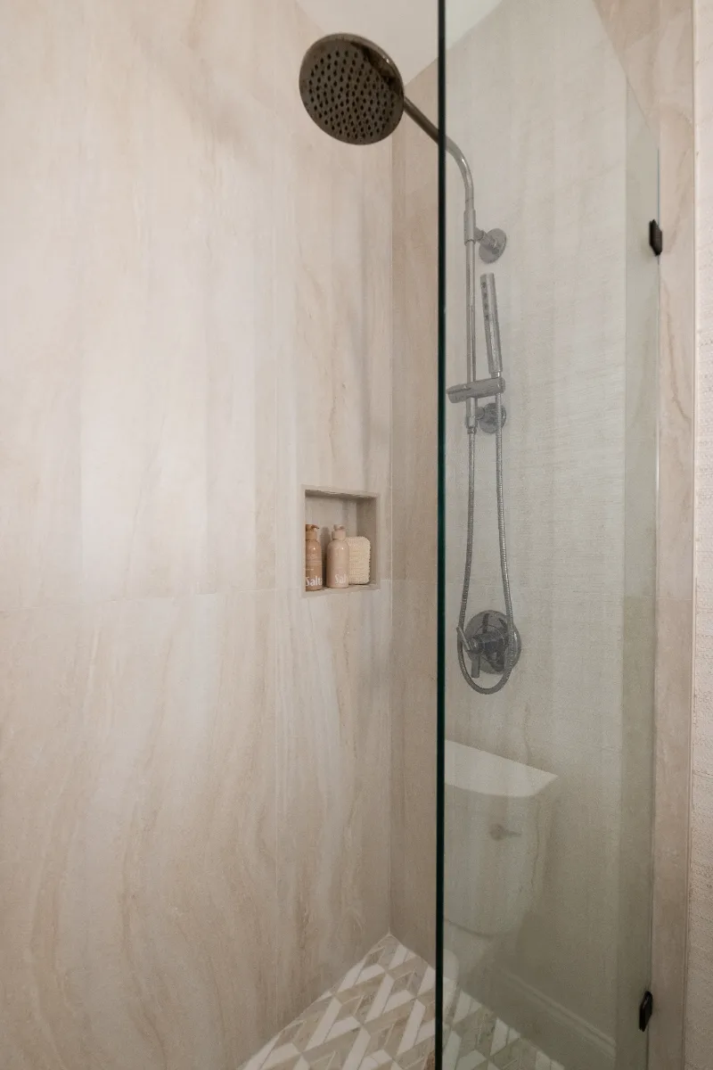 Guest Bath remodel in Westhaven, TN. Sebring Design Build designed this second Westhaven guest bath using the Hall Bath 2 selections, featuring MSI Calacatta Castana quartz, Rift White Oak cabinetry elements.