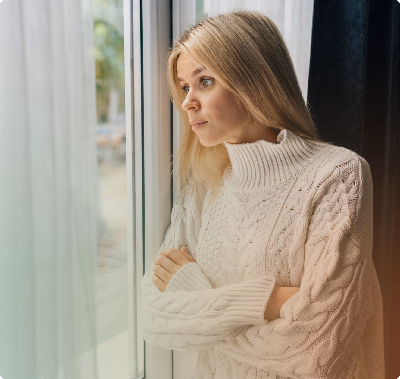 A woman looking out the window