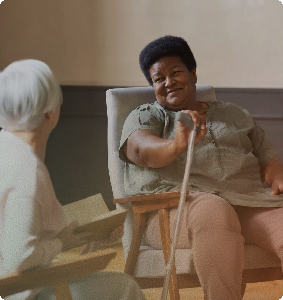 Two women sitting and talking