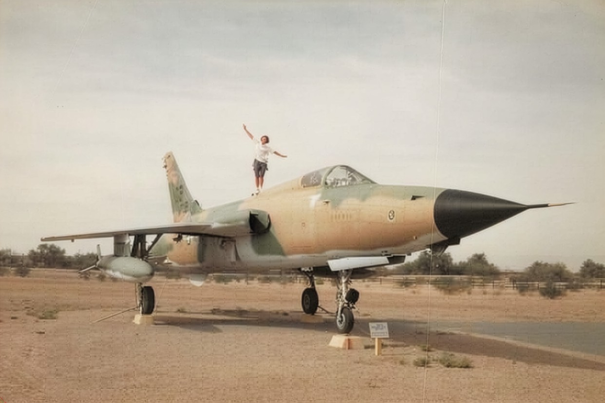 Susie Valencia in the cockpit of her father's Vietnam-era plane at age 23