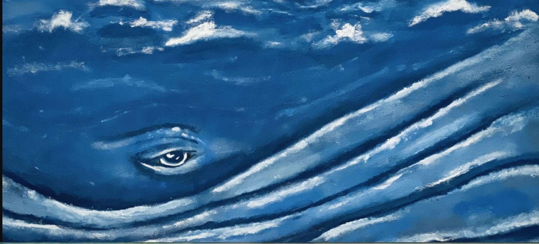 A student's paintings displayed in a bright studio during a Blue Whale portfolio session