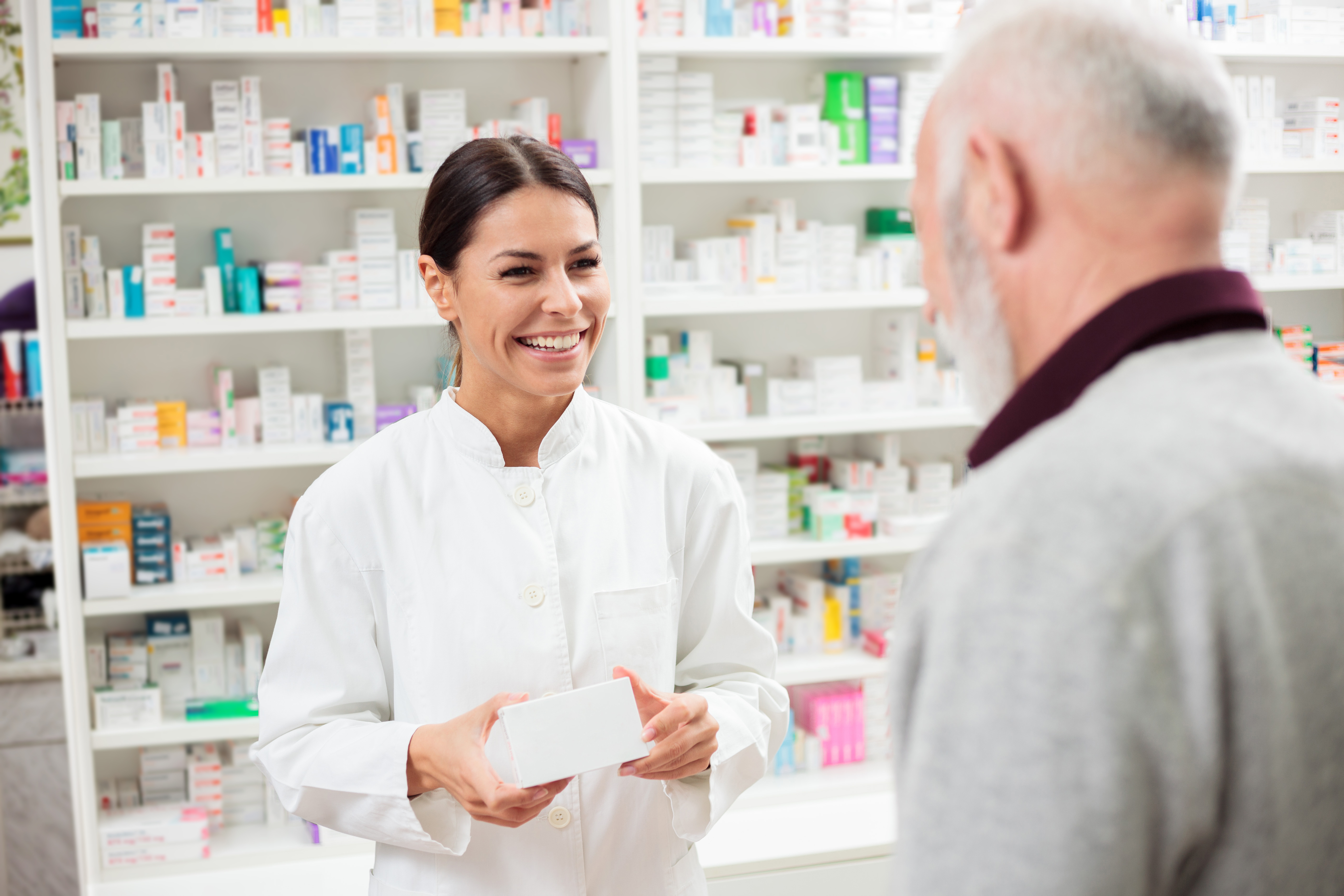 Pharmacist talking to patient