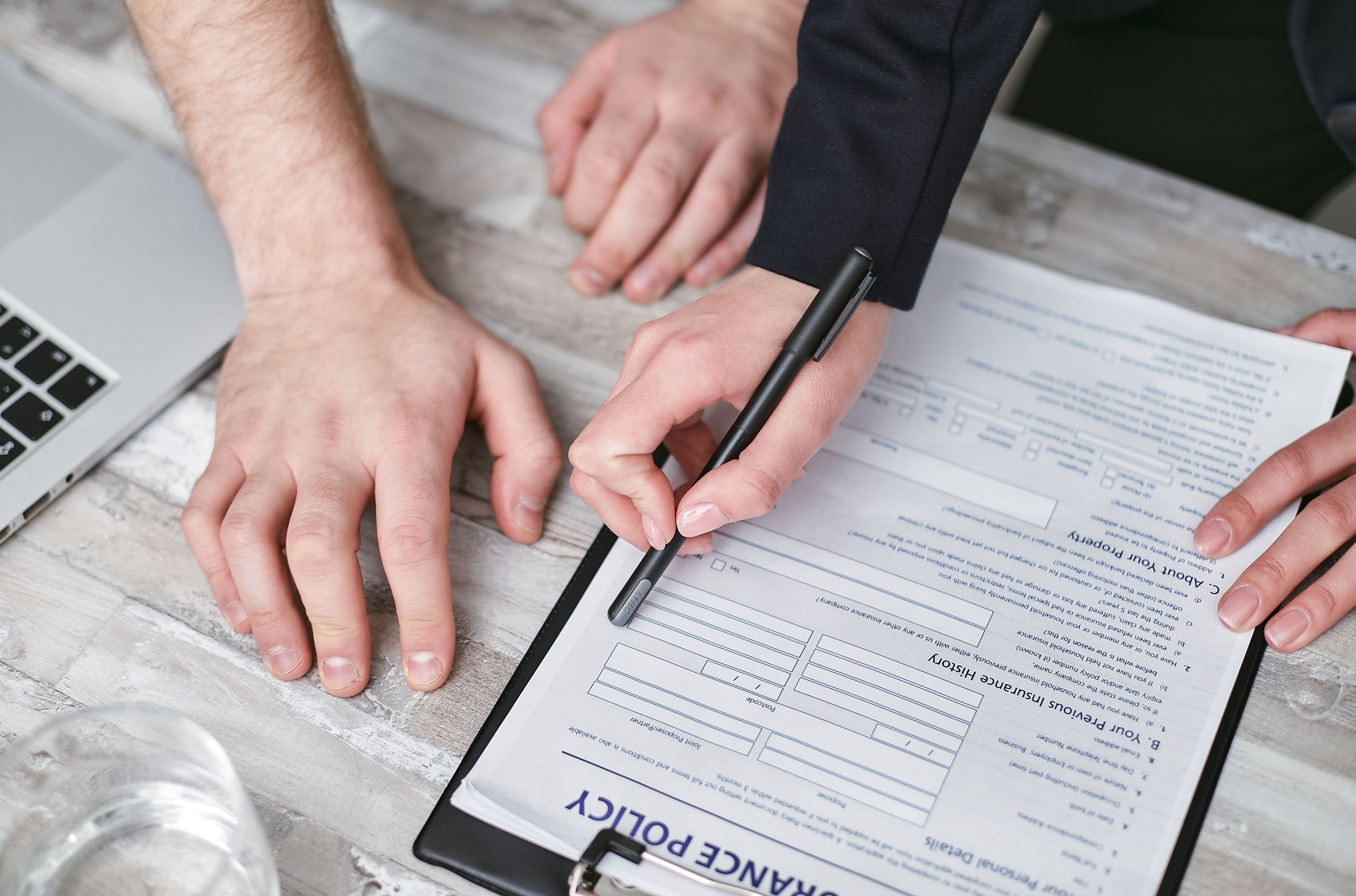 Reviewing insurance claim paperwork