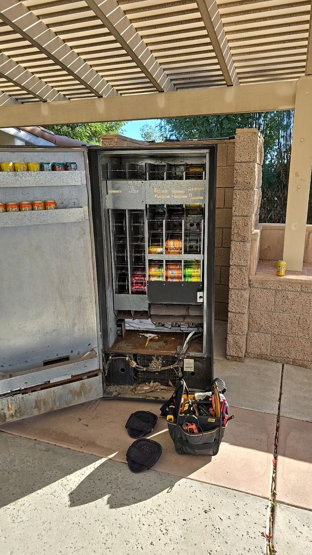 Vending machine being serviced