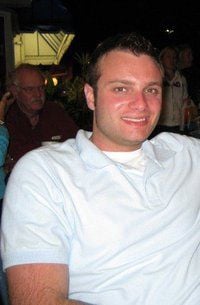 young man in white shirt