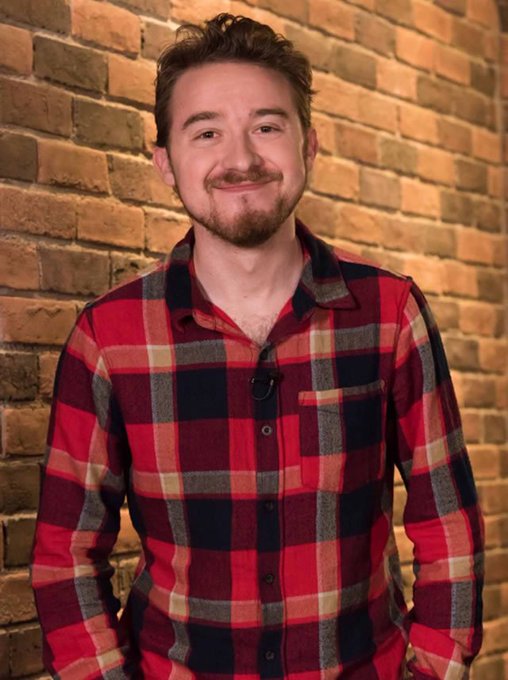 man wearing checkerd long sleeve