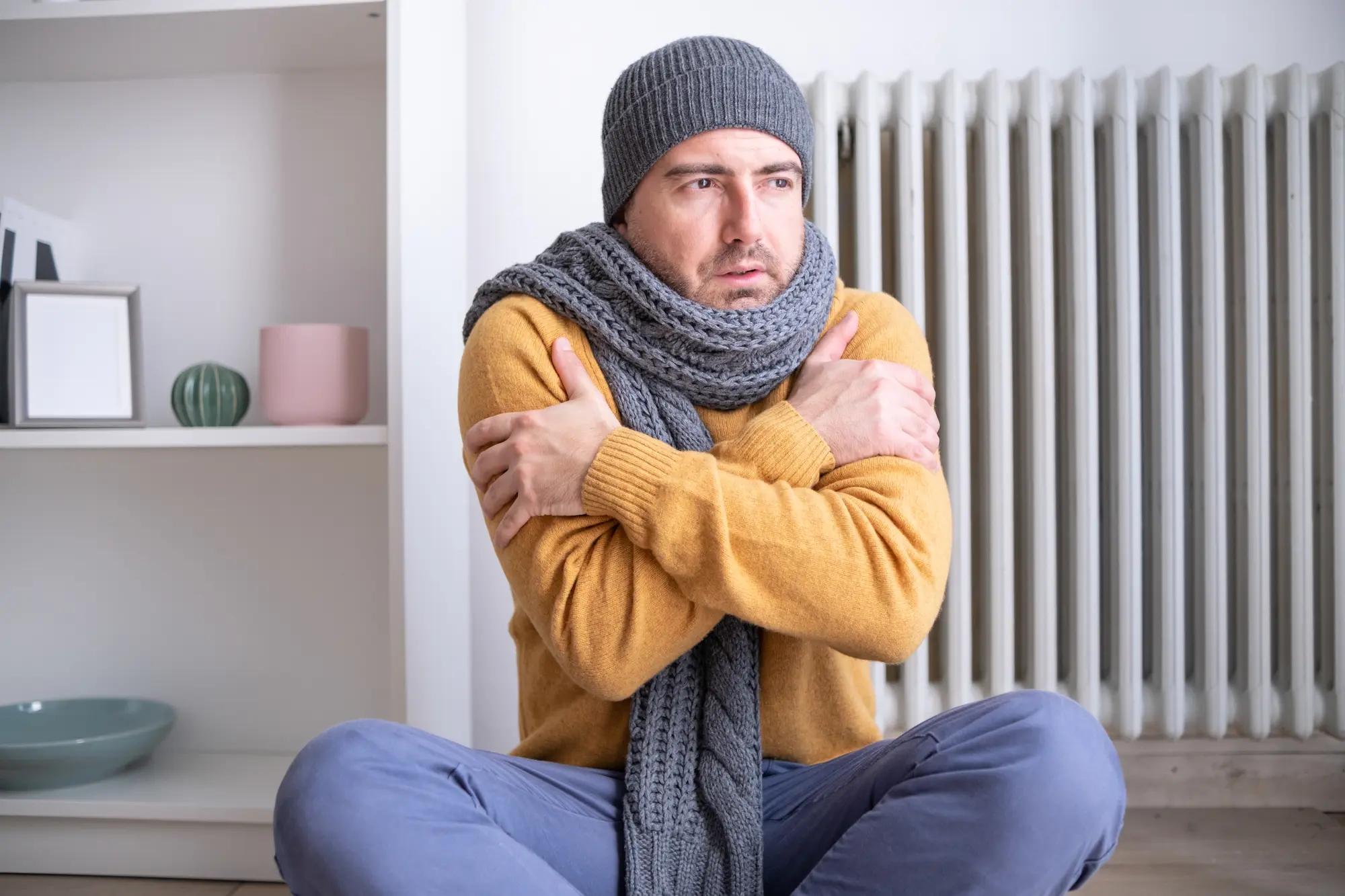 Man covering up because of cold weather