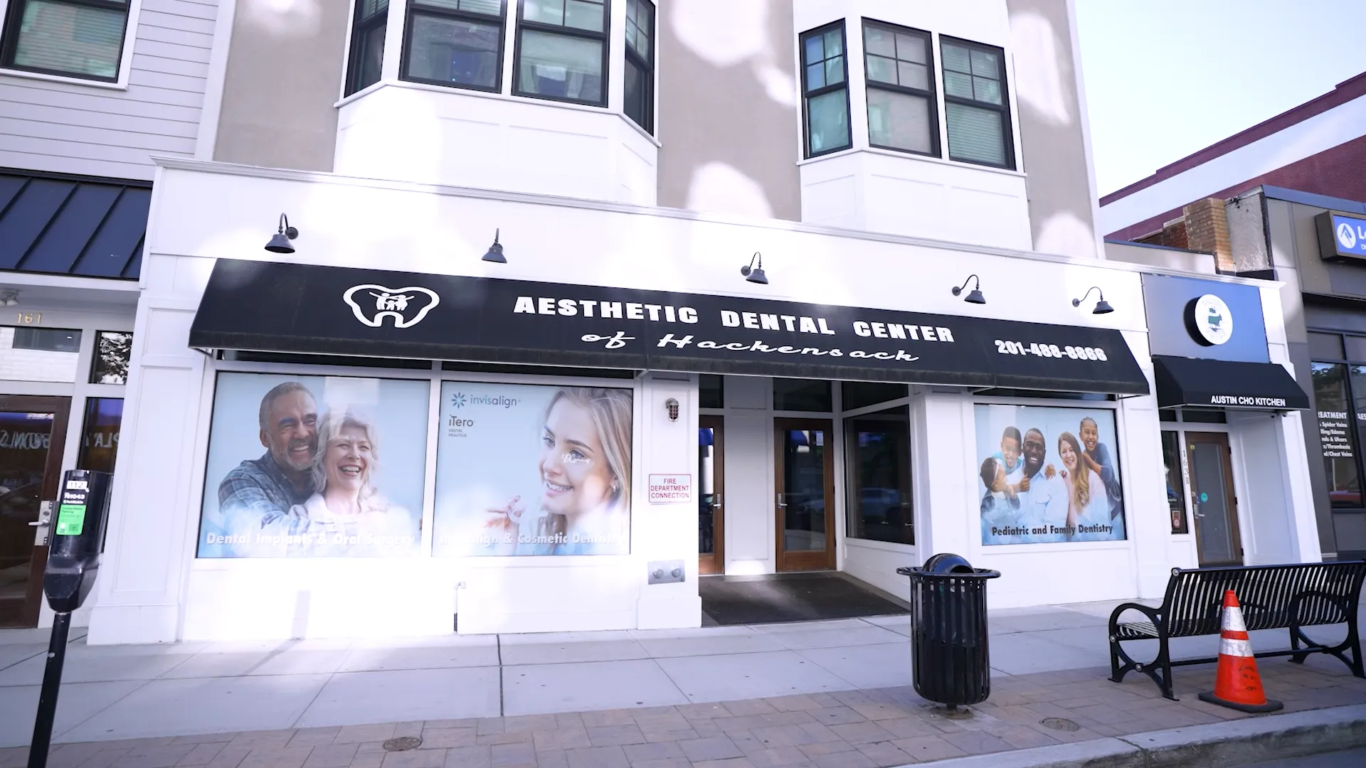 Aesthetic Dental Center building facade with black storefront signage