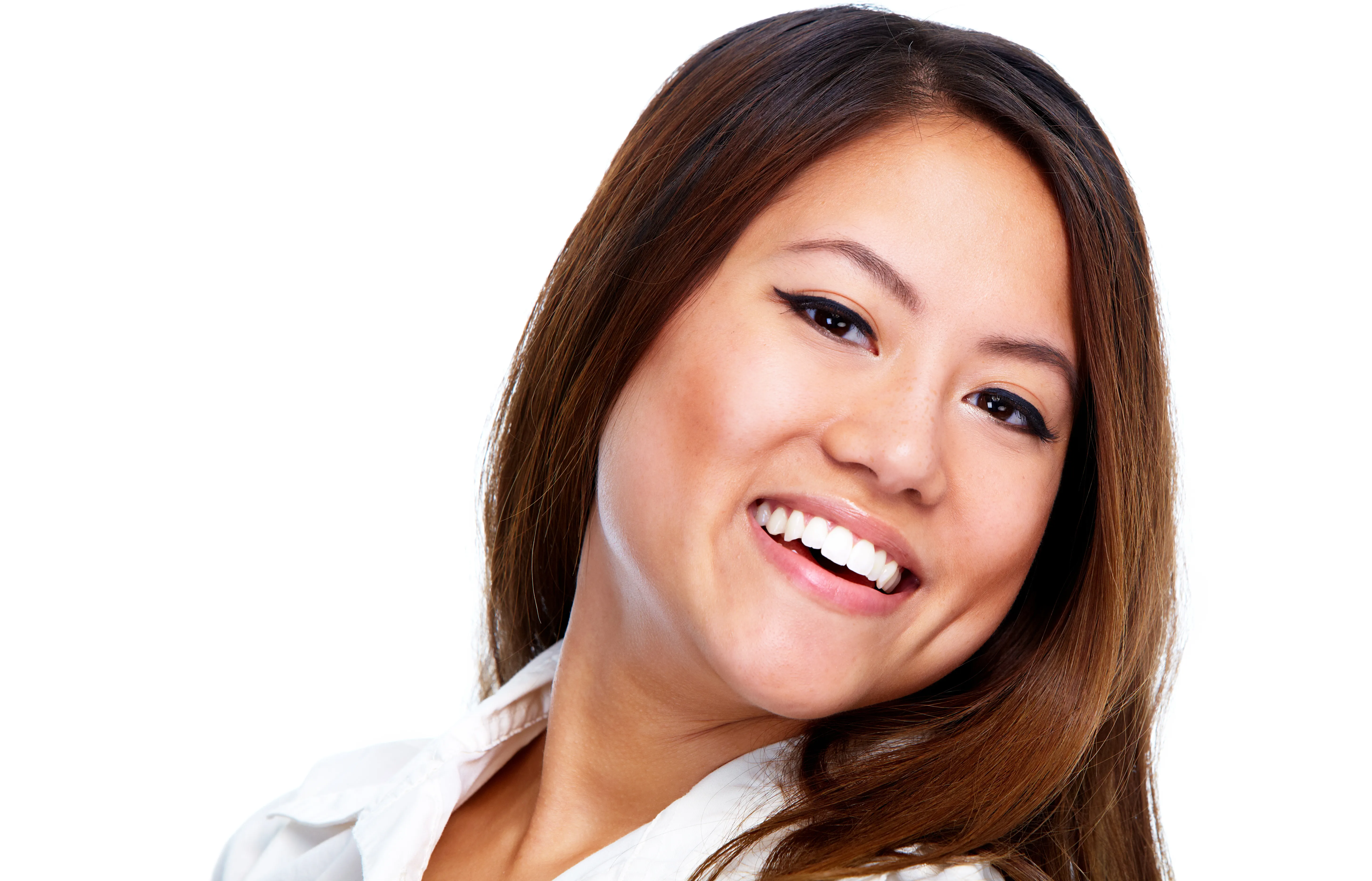 Mature patient smiling confidently after full-arch dental implant restoration