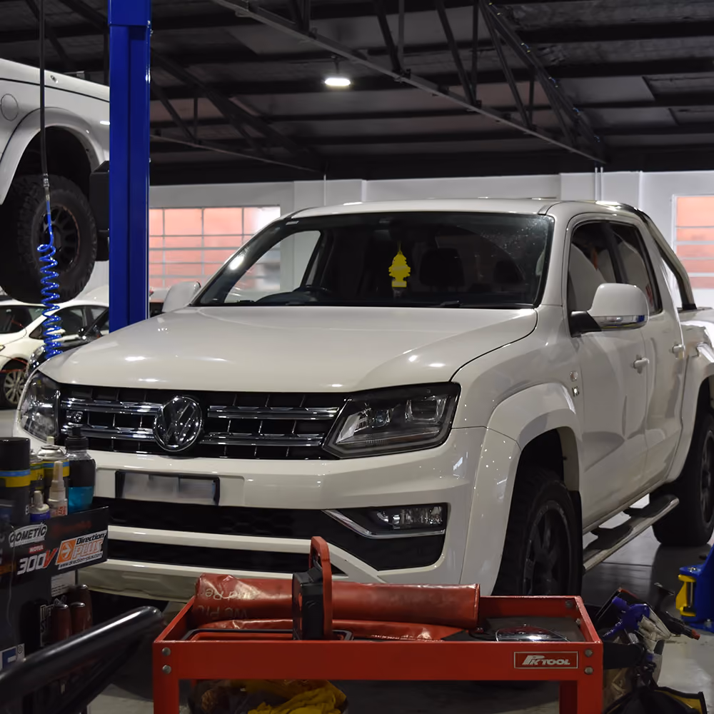 Volkswagen positioned in a service bay at the Auto Tech Group workshop.