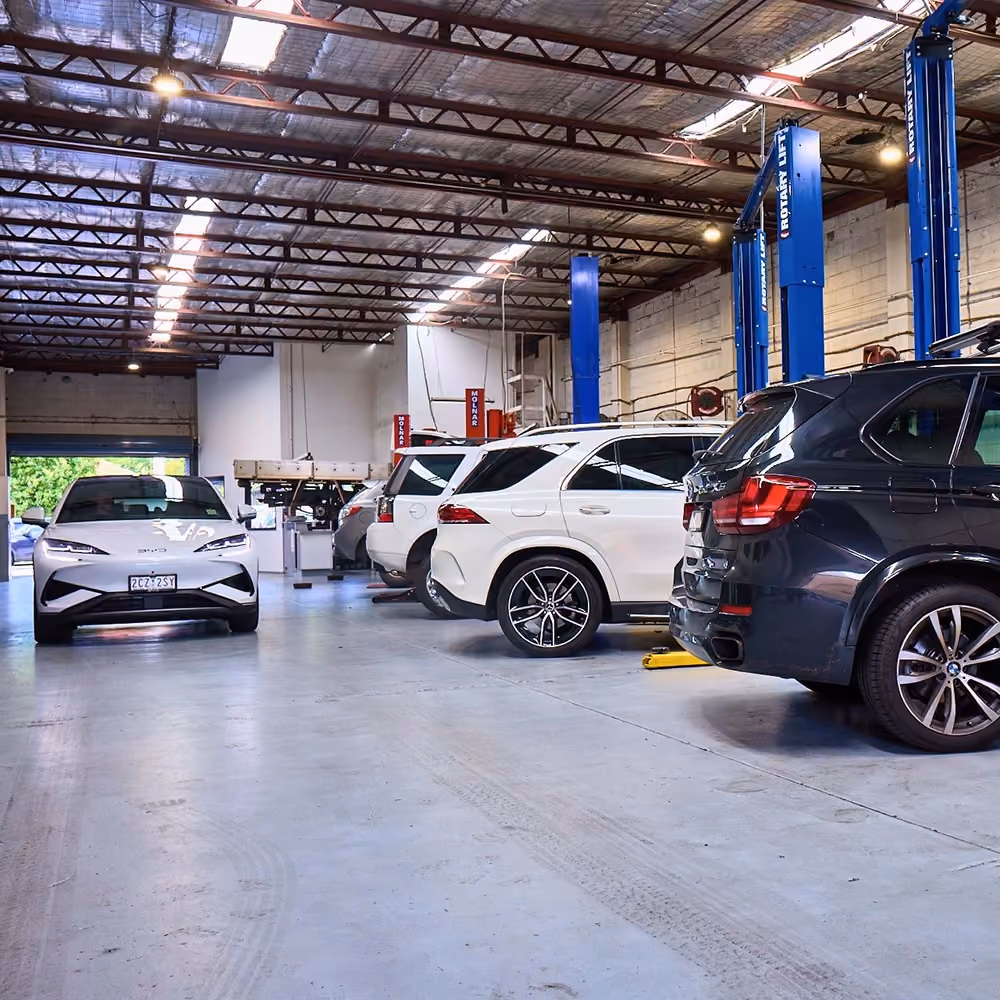 Fleet vehicles undergoing servicing at Auto Tech Group's Melbourne workshop.