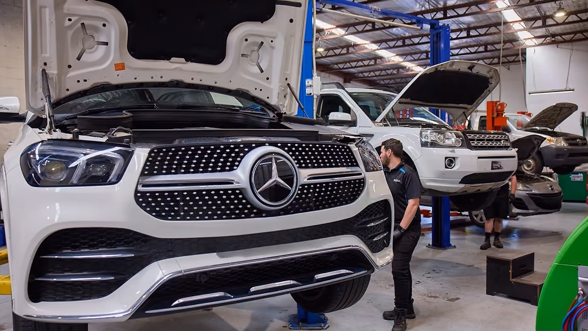 Mercedes-Benz and European vehicles being serviced by technicians at Auto Tech Group.