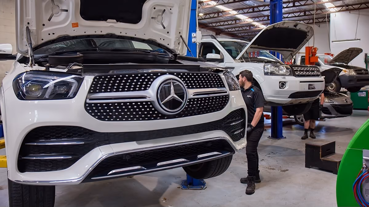 Mercedes-Benz on a hoist during a scheduled service at Auto Tech Group.