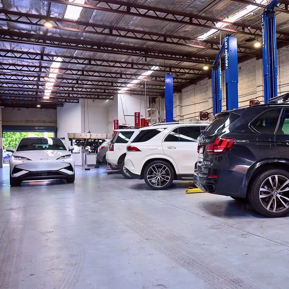 Fleet vehicles undergoing servicing at Auto Tech Group's Melbourne workshop.