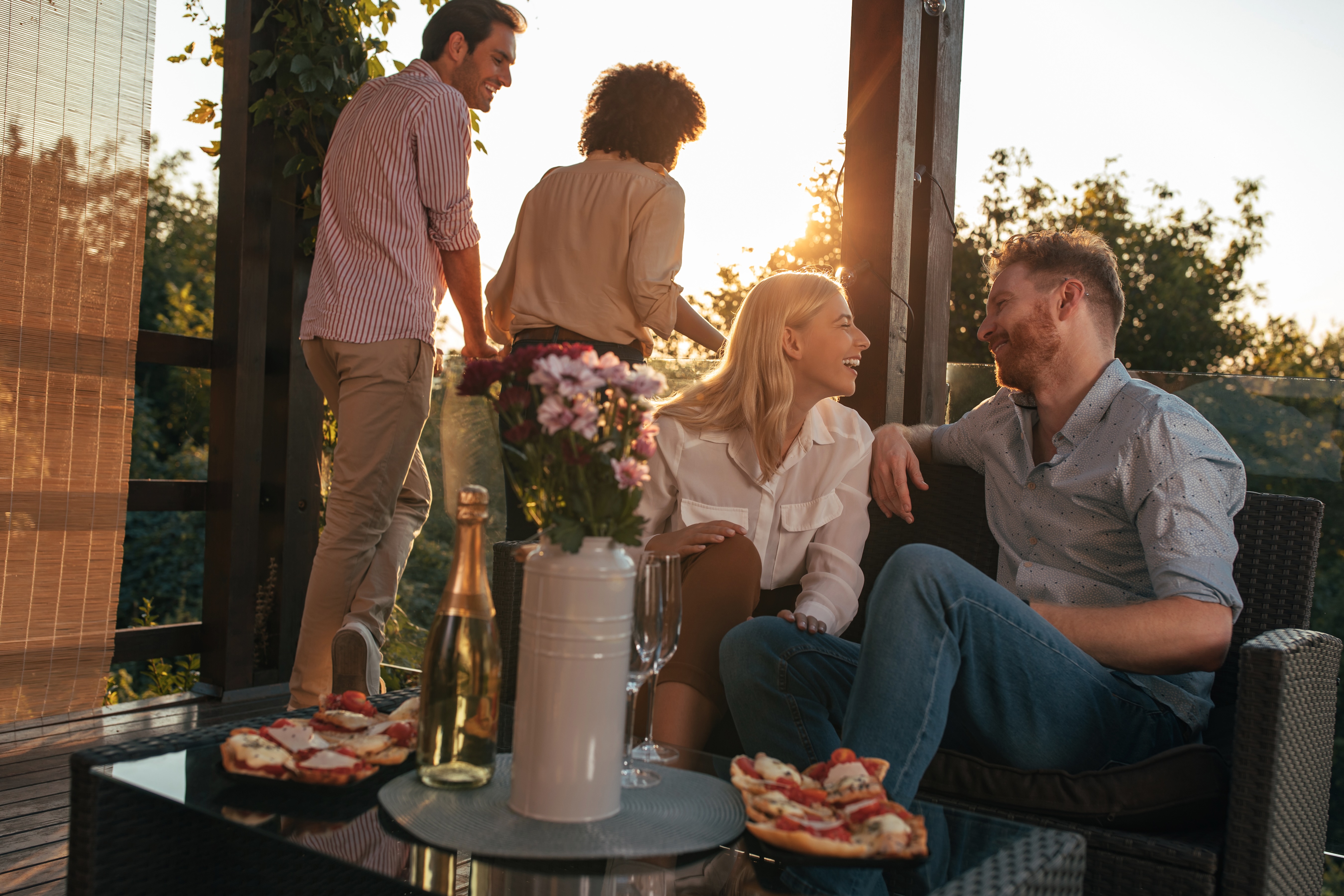 people on patio stock photo