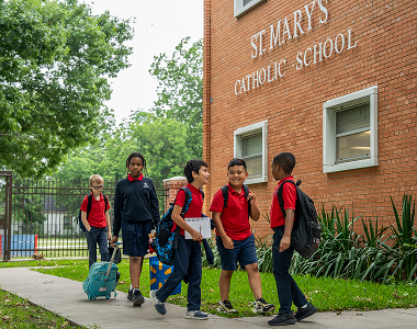 Students arriving at St. Mary's Catholic School entrance