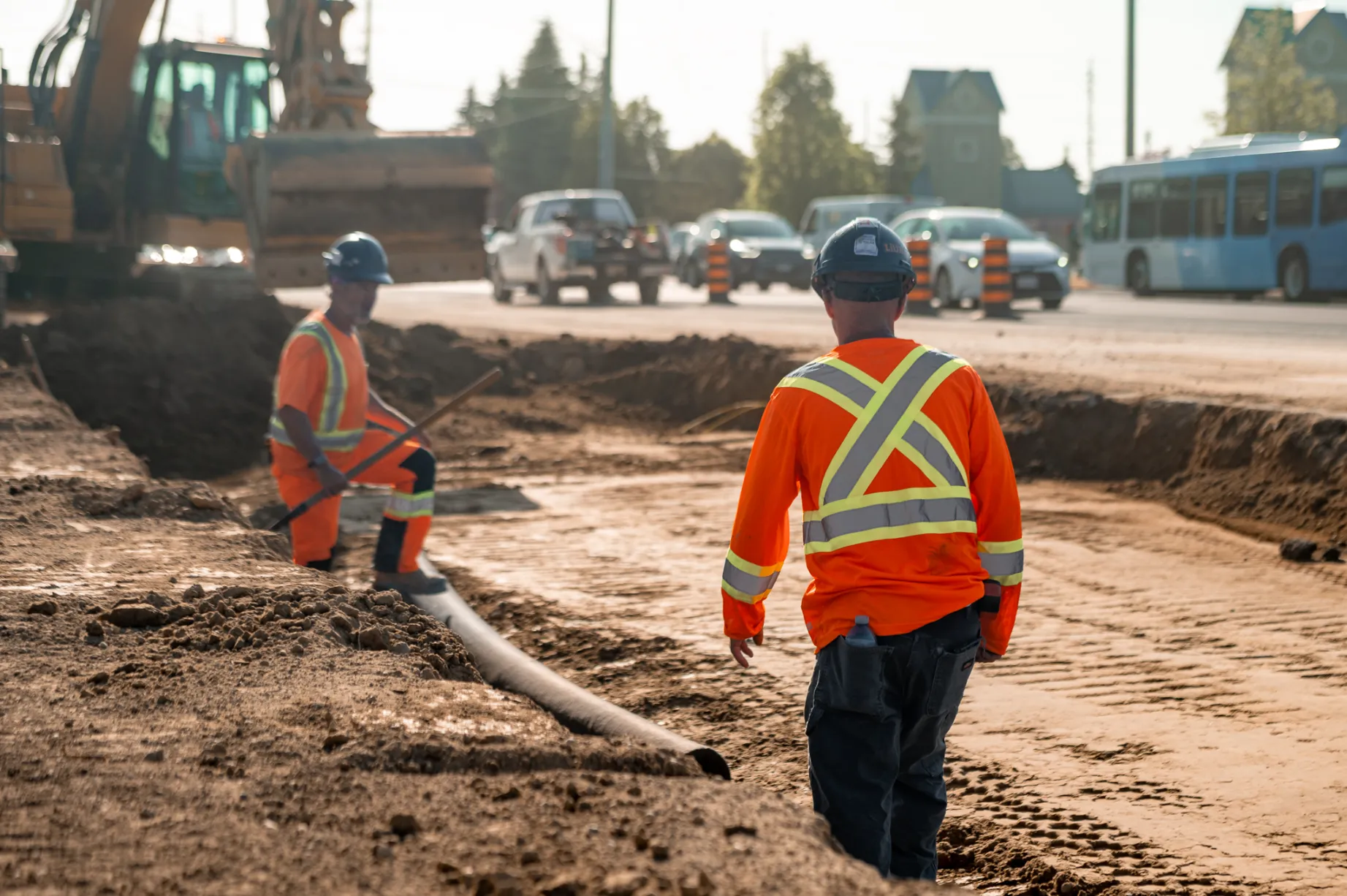 Two construction workers on site